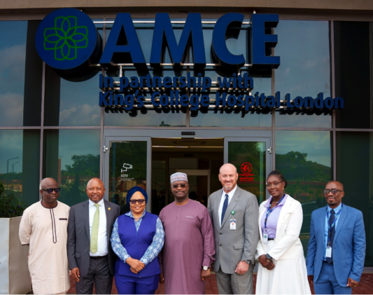 L–R: Olusola Babalola, Chief Financial Officer, African Medical Centre of Excellence (AMCE), Abuja; Kudakwashe Matereke, Director, Regional Operations (Anglophone West Africa), African Export-Import Bank (Afreximbank); Dr. Aisha Umar, Chief Medical Officer, African Medical Centre of Excellence (AMCE), Abuja; Dr. George Elombi, President and Chairman of the Board of Directors, African Export-Import Bank (Afreximbank); Brian Deaver, Chief Executive Officer, African Medical Centre of Excellence (AMCE); Dr. Gloria Rowland, Chief Nursing Officer, African Medical Centre of Excellence (AMCE); and Xolani Ndlovu, Lead Consultant Nuclear Medicine, African Medical Centre of Excellence (AMCE), Abuja, during Dr. George Elombi's visit and tour of the AMCE facility in Abuja.
